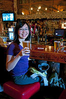 Charlotte drinking a seasonal Summer Alaska Ale